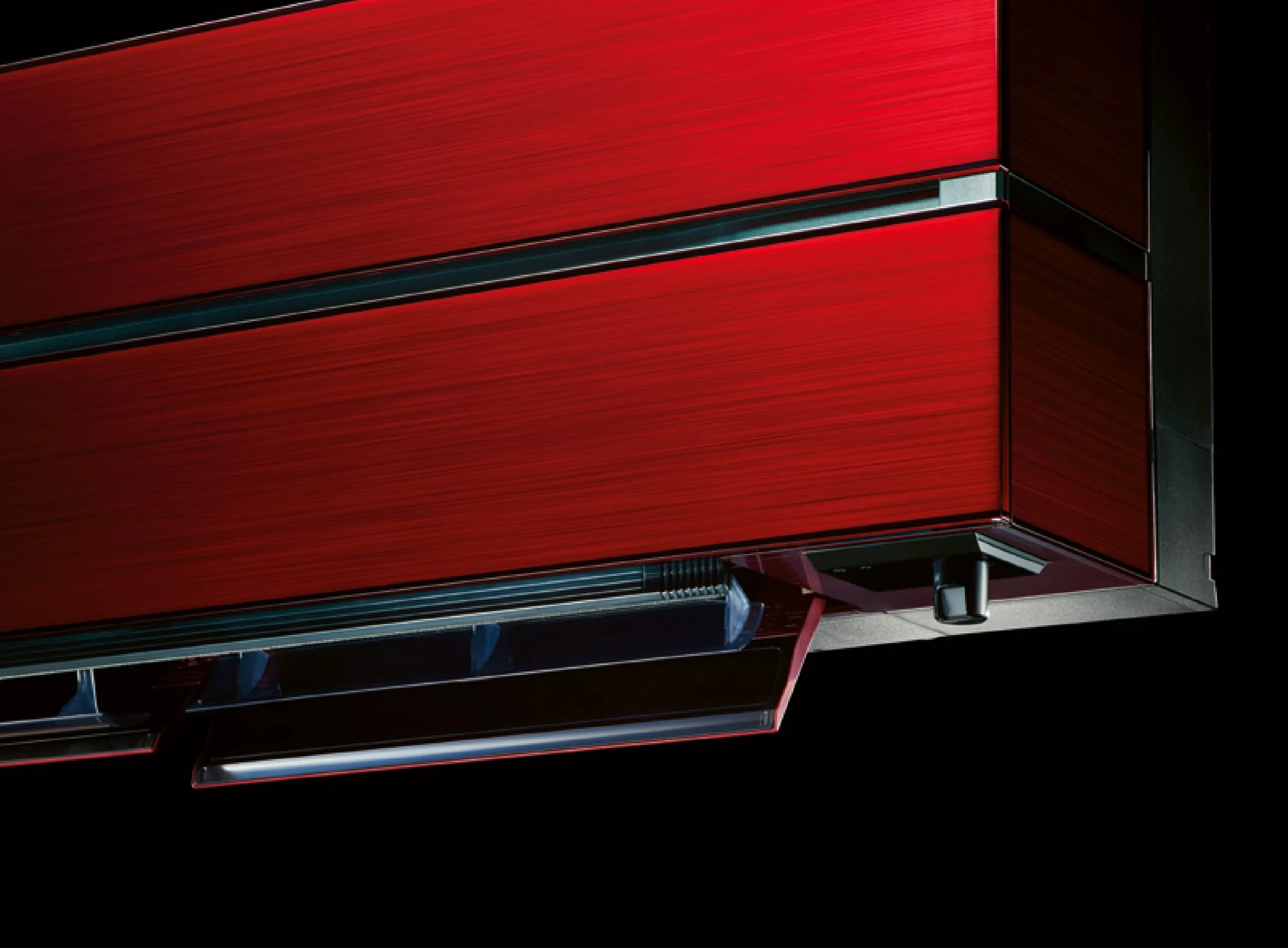 Detailaufnahme des Diamond Wandgeräts MSZ-LN in Ruby Red mit Blick auf Ausblaslamellen und 3D i-see Sensor